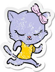 distressed sticker of a cute cartoon cat with bow