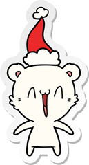 happy polar bear hand drawn sticker cartoon of a wearing santa hat