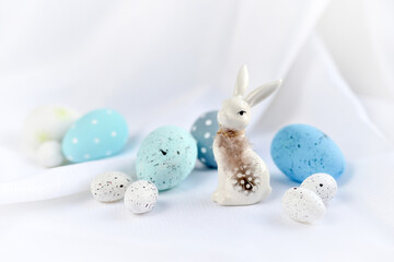Easter composition with white rabbit and eggs on a white background. The minimal concept. - 775862075