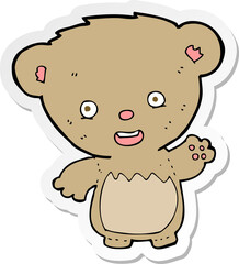 sticker of a cartoon teddy bear waving