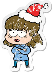 hand drawn distressed sticker cartoon of a tired woman wearing santa hat
