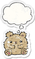 cute cartoon bear with thought bubble as a distressed worn sticker