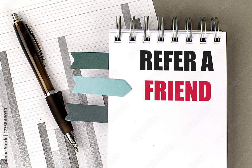 Poster refer a friend text on notebook with chart on gray background