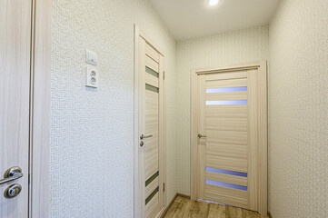 standard room interior apartment. room doors, renovation corridor lobby entrance hall