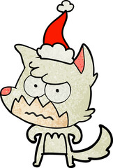 hand drawn textured cartoon of a annoyed fox wearing santa hat