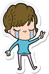 sticker of a cartoon woman crying