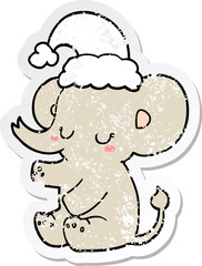 distressed sticker of a cute christmas elephant