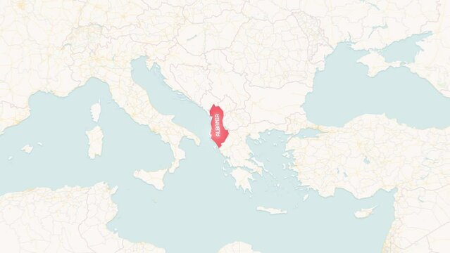 Zoom in to the white map of Albania with text and a flag