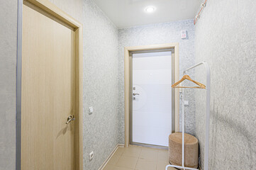 standard room interior apartment. room doors, renovation corridor lobby entrance hall