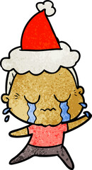 hand drawn textured cartoon of a crying old lady wearing santa hat