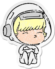 distressed sticker of a cartoon curious astronaut
