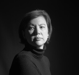 mature woman black and white portrait in short light