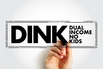 DINK Dual Income No Kids - describes a couple without children living together while both partners are receiving an income, acronym text concept stamp - obrazy, fototapety, plakaty