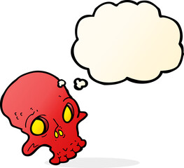 cartoon spooky skull with thought bubble