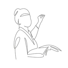 teacher writes on the blackboard