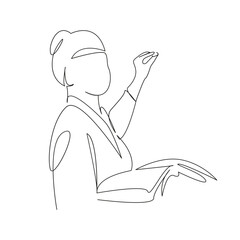 teacher writes on the blackboard