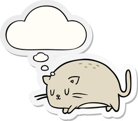cute cartoon cat with thought bubble as a printed sticker