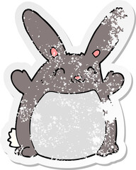 distressed sticker of a cartoon rabbit