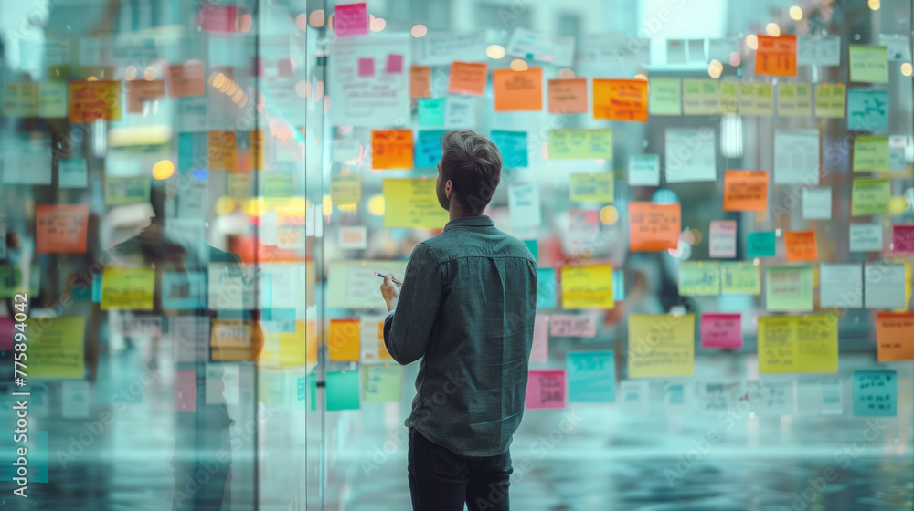Poster business process, team collaboratively designing workflow diagrams on a transparent surface