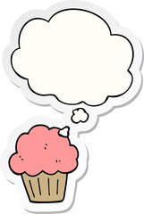 cartoon  muffin with thought bubble as a printed sticker