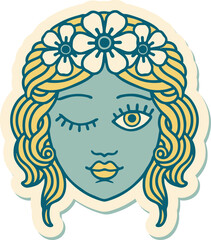 sticker of tattoo in traditional style of a maidens face winking
