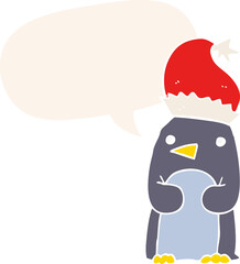cute christmas penguin with speech bubble in retro style