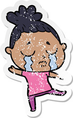 distressed sticker of a cartoon crying woman