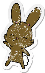 distressed sticker of a curious bunny cartoon