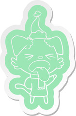 quirky cartoon  sticker of a dog wearing scarf and pullover wearing santa hat