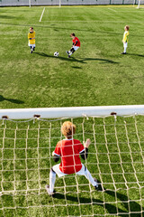 A group of young children, full of energy and enthusiasm, playing an exciting game of soccer.
