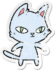distressed sticker of a cartoon cat staring