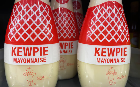 Viersen, Germany - April 3. 2024: Closeup of bottles japanese Kewpie Mayonnaise in german store shelf