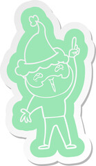 quirky cartoon  sticker of a happy bearded man wearing santa hat