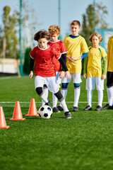 A group of vibrant young children playing an enthusiastic game of soccer on a grassy field. They...