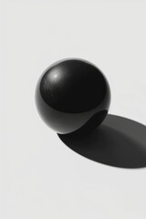 A black egg placed on a white surface. Ideal for food and cooking concepts