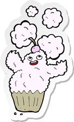 sticker of a cartoon cupcake monster