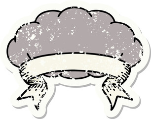 worn old sticker with banner of a grey cloud