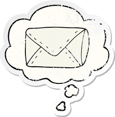 cartoon envelope with thought bubble as a distressed worn sticker