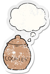 cartoon cookie jar with thought bubble as a distressed worn sticker