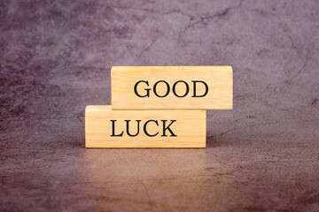 GOOD LUCK symbol on wooden blocks. The concept of a business idea