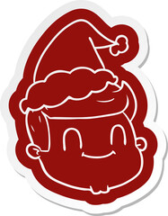 quirky cartoon  sticker of a male face wearing santa hat