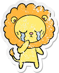 distressed sticker of a crying cartoon lion