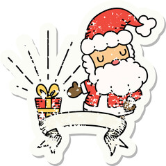 worn old sticker of a tattoo style santa claus christmas character