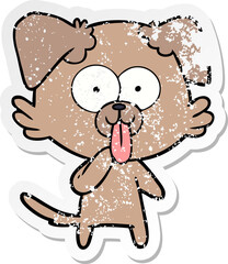 distressed sticker of a cartoon dog with tongue sticking out
