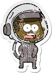 distressed sticker of a cartoon surprised astronaut