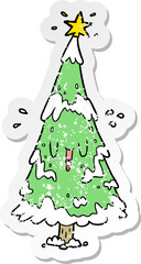 distressed sticker of a cartoon christmas tree