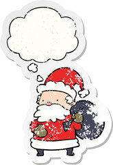 cartoon santa claus with thought bubble as a distressed worn sticker
