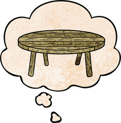 cartoon table with thought bubble in grunge texture style