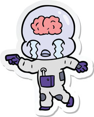 sticker of a cartoon big brain alien crying