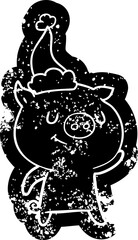 happy quirky cartoon distressed icon of a pig wearing santa hat